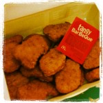 box of chicken mcnuggets from mcdonald's with tangy barbeque sauce