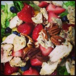 brightly colored strawberry poppy salad from panera bread