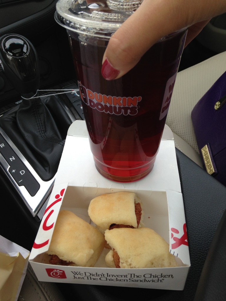 cup of dunkin donuts iced tea drink with box of three chick-fil-a chick-n-minis breakfast sandwiches