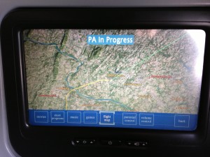 tv screen showing in flight map of plane's progress
