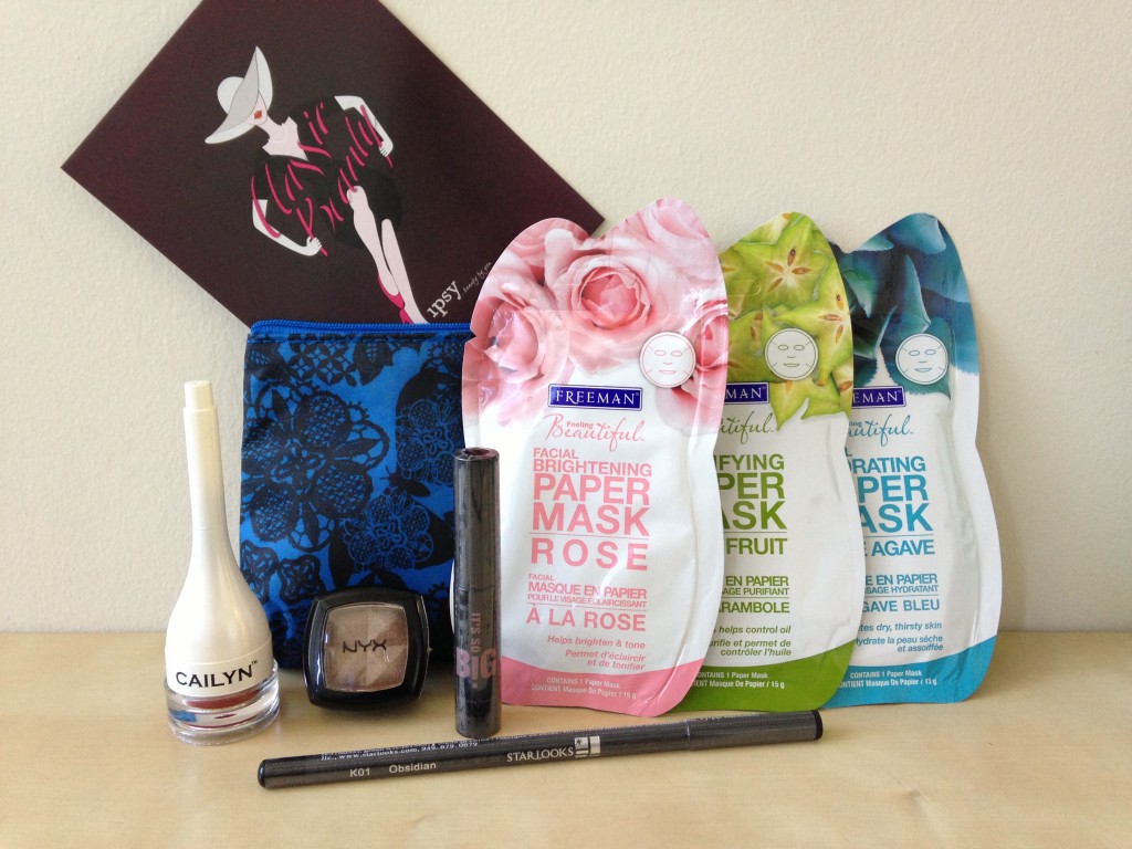 ipsy september 2013 bag items with card including cailyn tinted lip balm in big apple, nyx eye shadow in fantasy, it's so big volumizing mascara, freeman paper masks in rose, star fruit, and blue agave, and starlooks eye pencil in obsidian