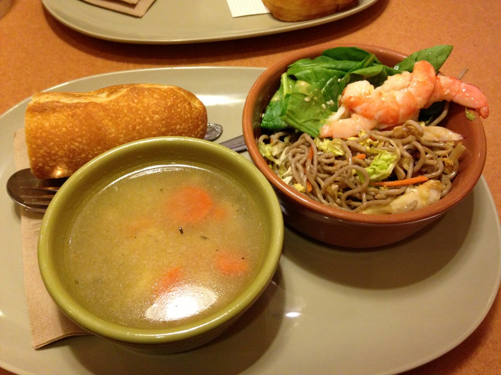 panera bread you pick two combination meal with chicken noodle soup and soba noodle salad topped with shrimp and spinach plus french bread on the side