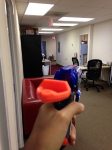 nerf gun held up at the ready prepared to shoot