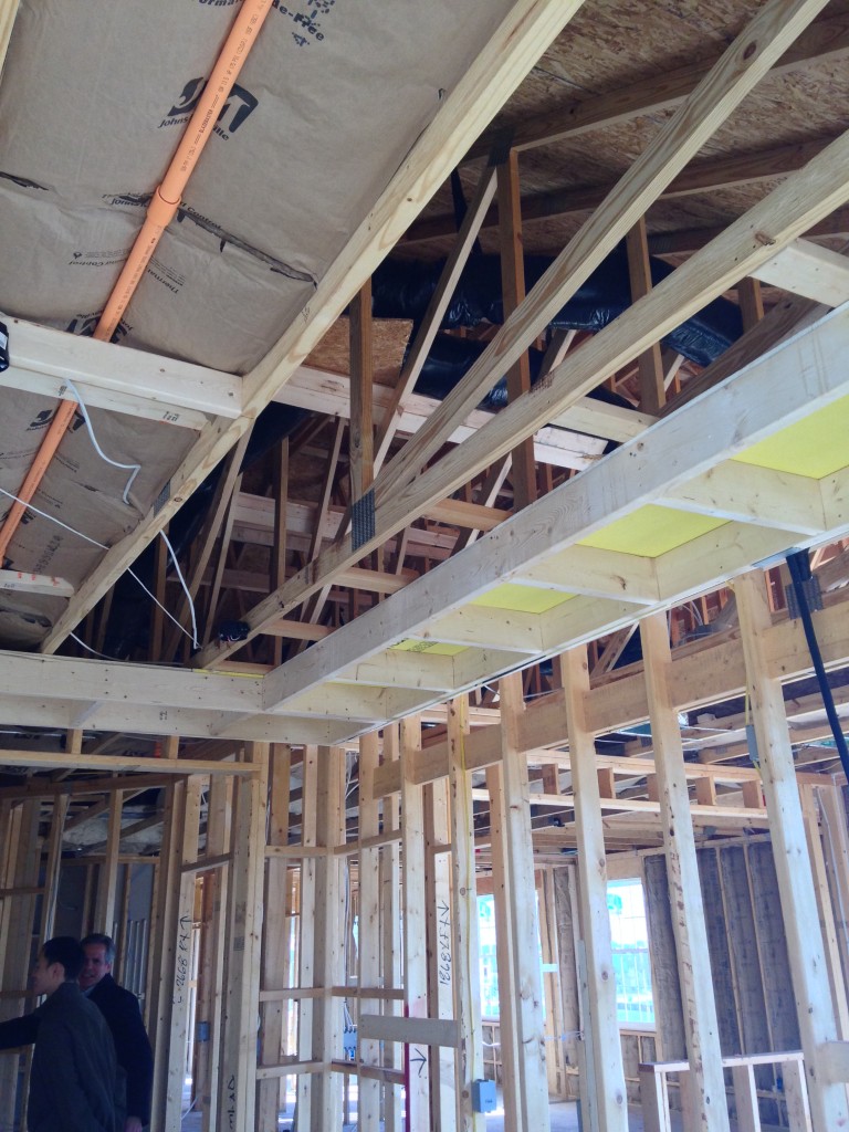 wooden beams for framework of walls and ceiling of condo under construction