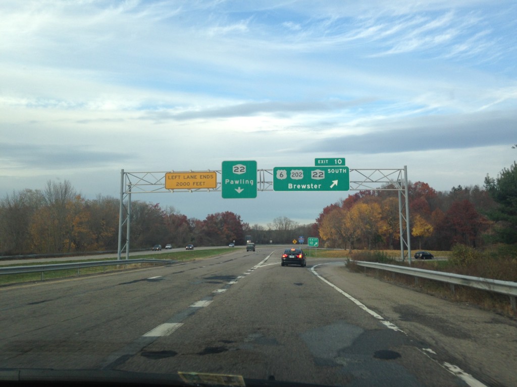 freeway exit sign for brewster