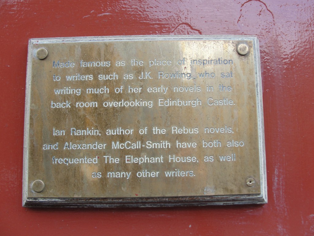 plaque detailing the elephant house in edinburgh's history of inspiring authors like jk rowling, ian rankin, and alexander mccall-smith