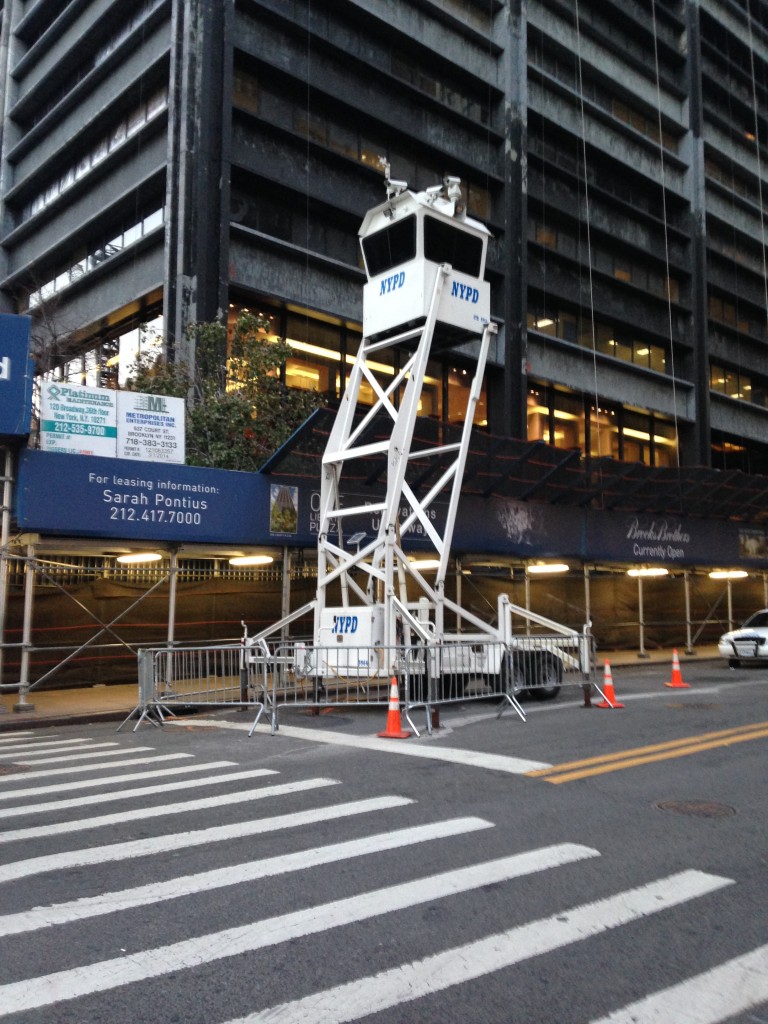 nypd raised viewing cube higher than second story of building