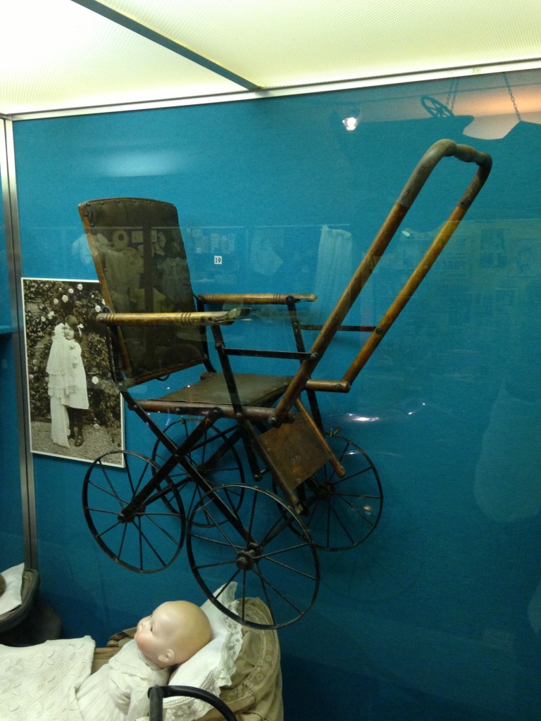 old stroller from long ago in museum of childhood in edinburgh