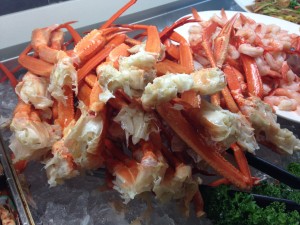 giant pile of crab legs and chilled shrimp at chinese buffet