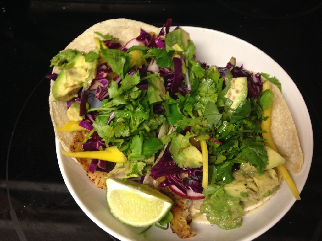 blue apron chili-dusted fish tacos with pickled red cabbage, mango & avocado finished product