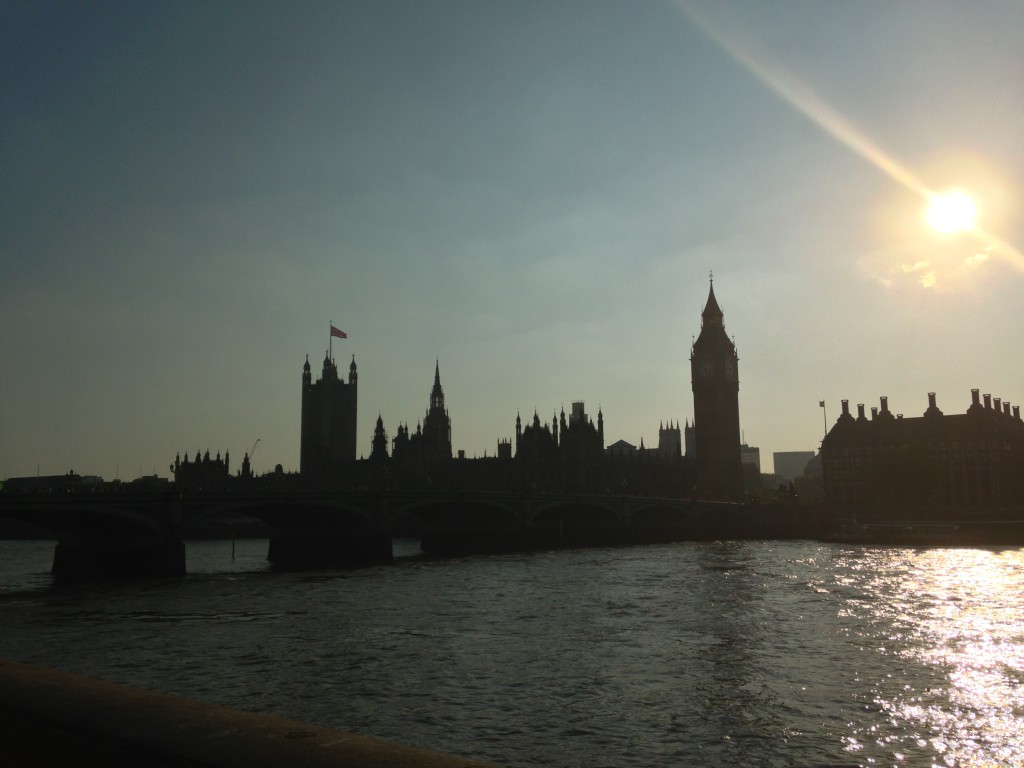 silhouette view of british parliament building across river thames
