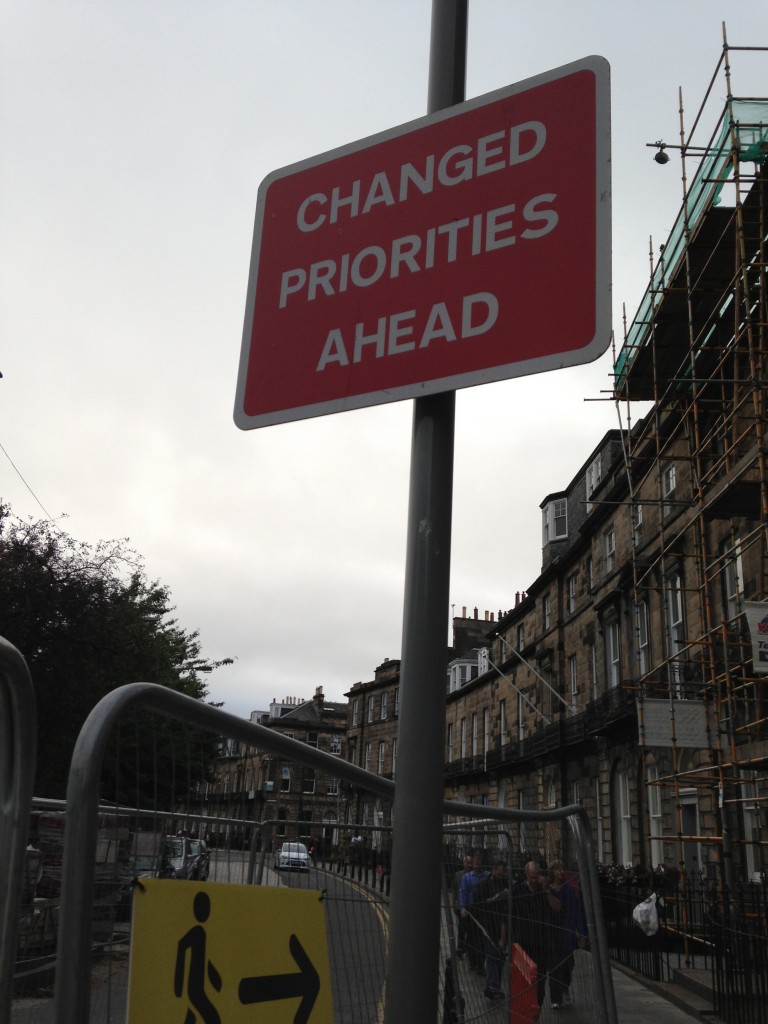 red and white changed priorities ahead sign in edinburgh
