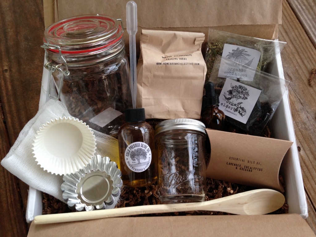 contents of the homegrown collective december 2013 box with naturally essential home remedies and cure-alls theme