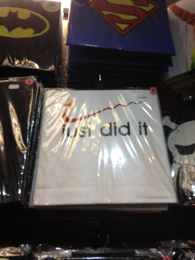 t-shirt with sperm in place of nike logo and "just did it" messaging