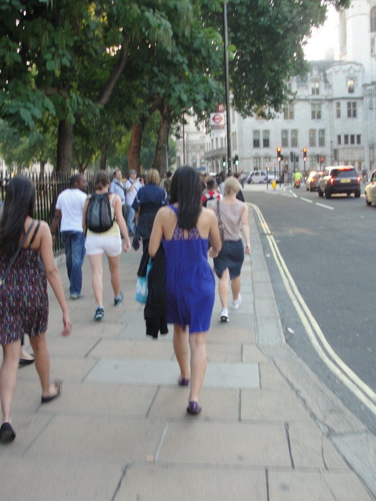 pedestrians walking on streets of london