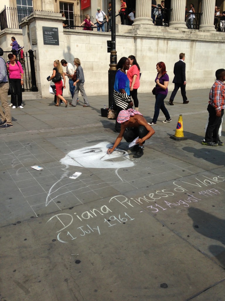 sidewalk chalk artist sketching face of diana princess of wales