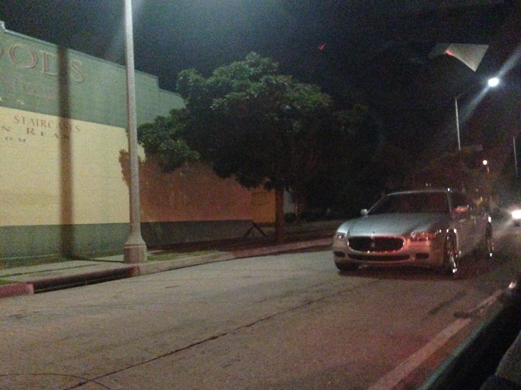 stalled maserati in middle of street turned off blocking traffic