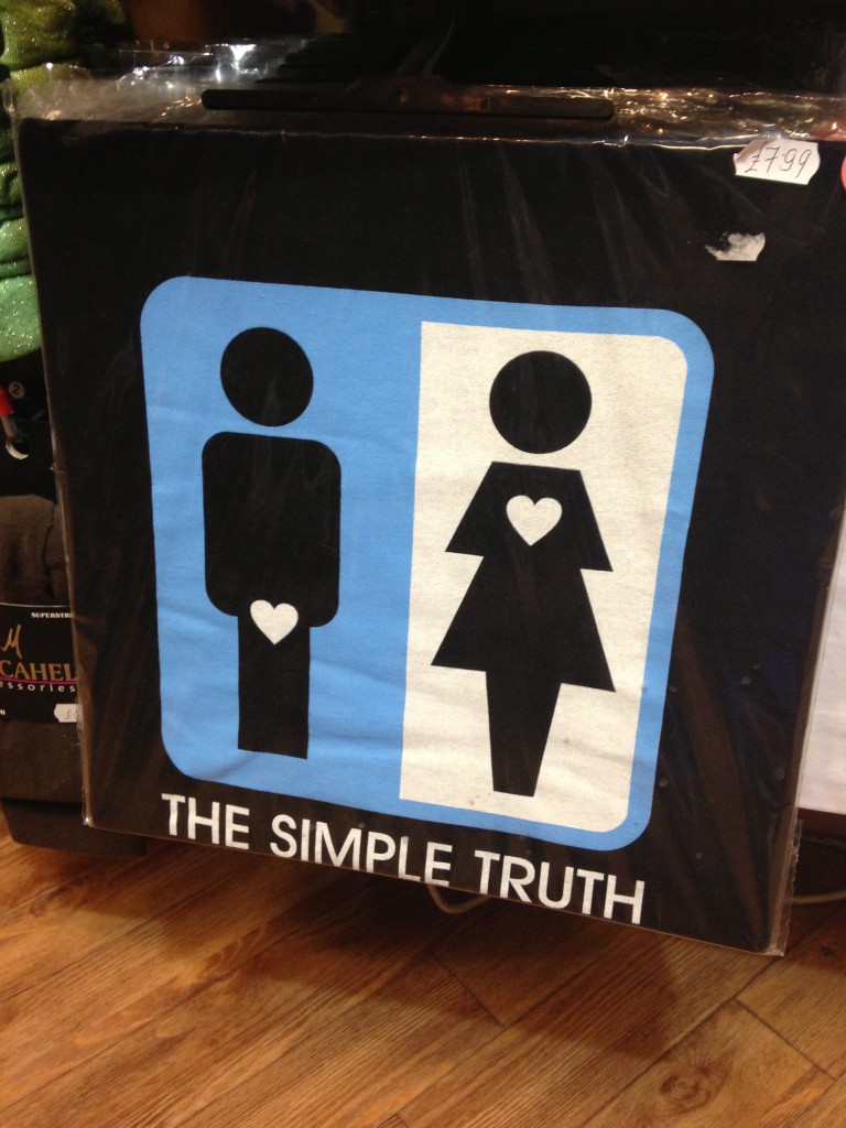 t-shirt with image of guy with heart at crotch and girl with heart near heart and "the simple truth" messaging