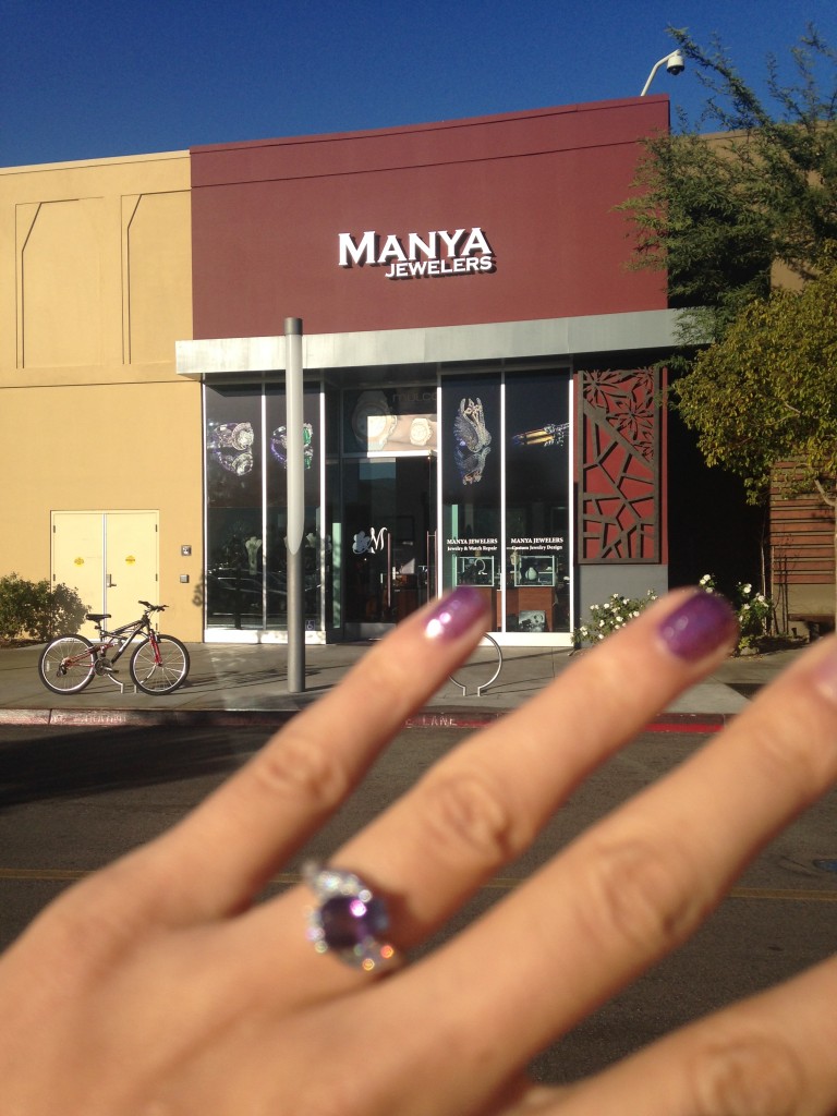 manya jewelers storefront at valencia town center mall with engagement ring made there in foreground