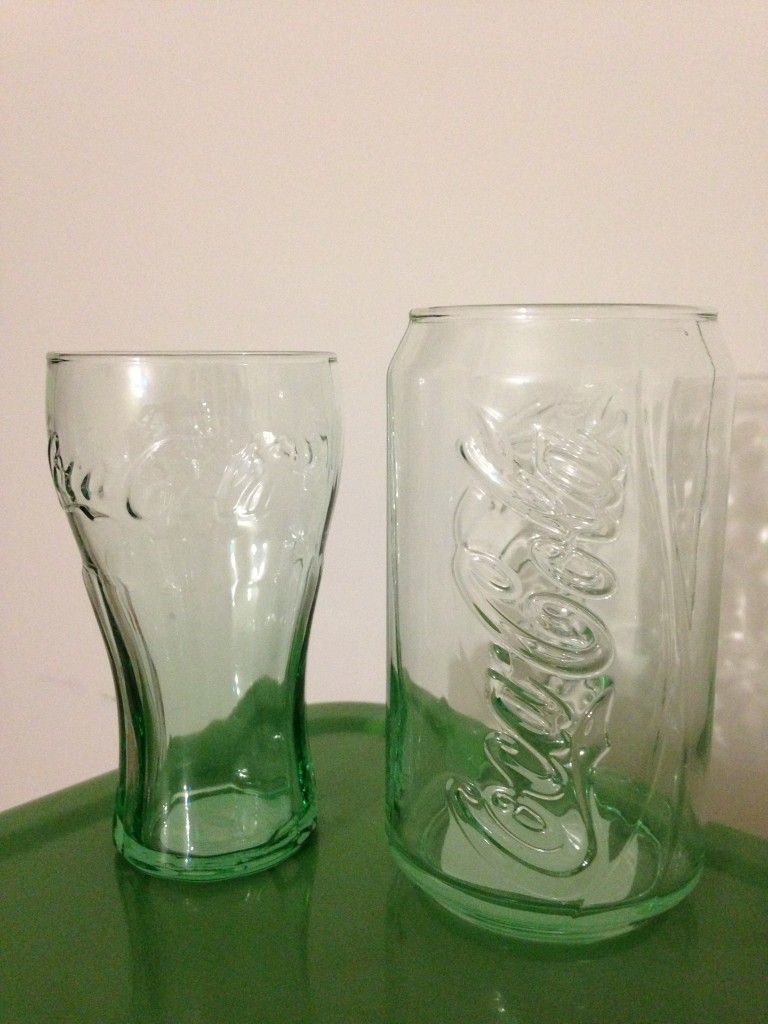 coca-cola glasses with one in shape of soda can