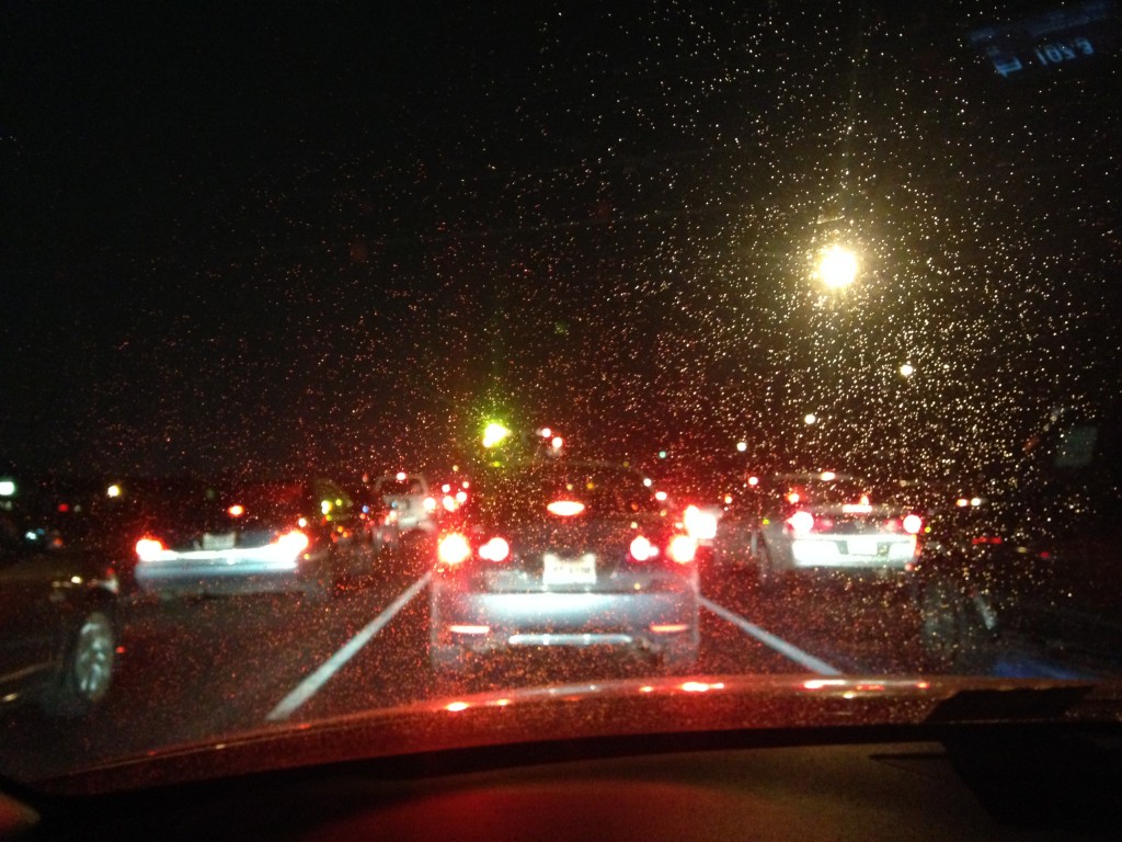 small drops of melted snow on windshield