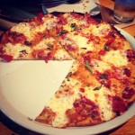 california pizza kitchen pizza with one slice missing