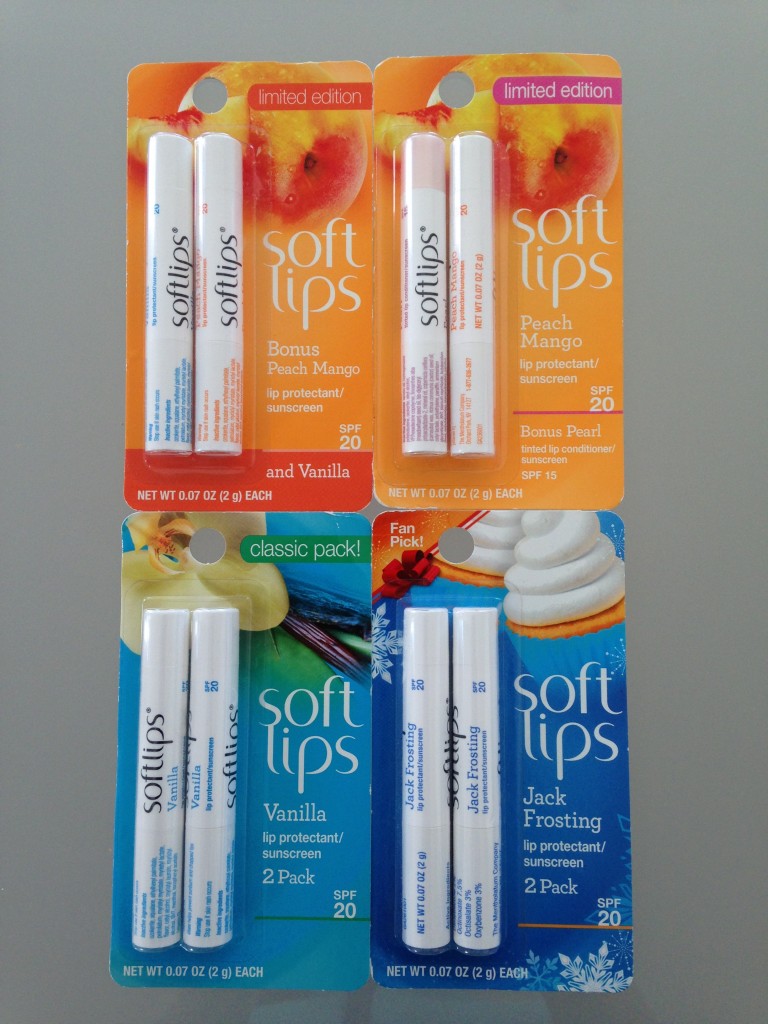 four sets of softlips lip balms in peach mango, vanilla, pearl, and jack frosting