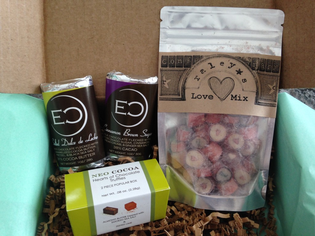 treatsie february 2014 box contents with chocolate bars, chocolate truffles, and hard candy