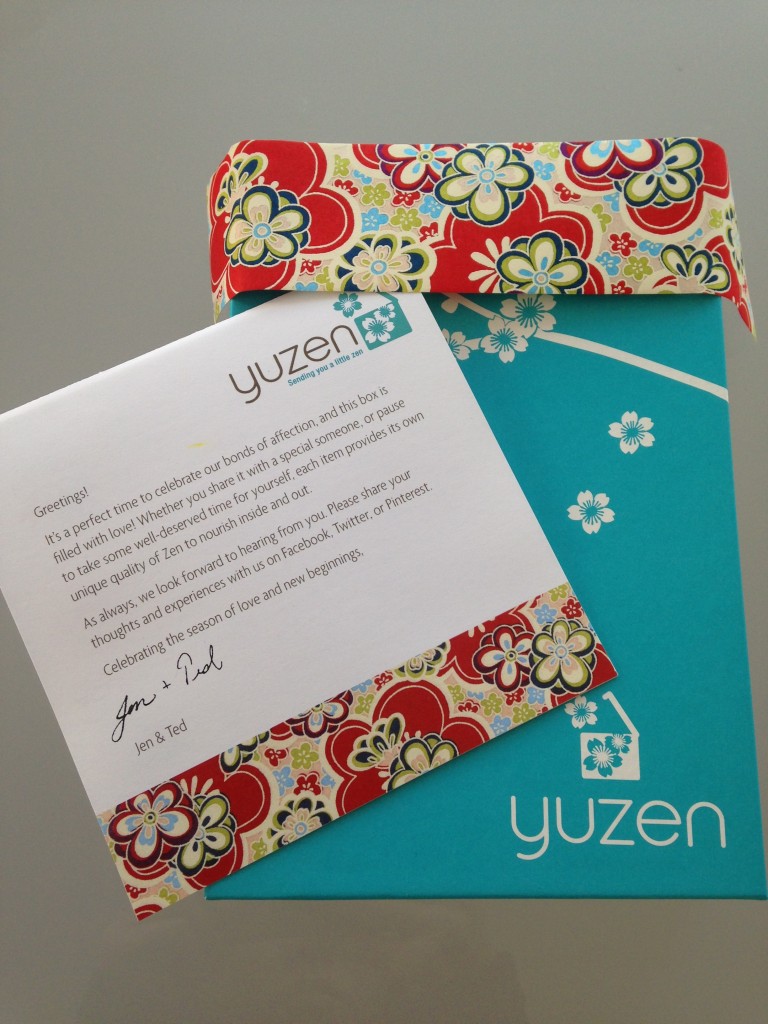 yuzen box with white flowers on aqua background and spring info card