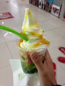 cup of chinese frozen yogurt with fruit toppings
