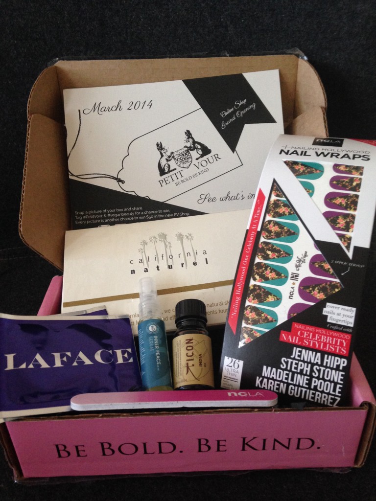 contents of petit vour march 2014 box with laface lotion, lotus wei serum, icon oil, ncla nail wraps and nail file, and california naturel skincare set
