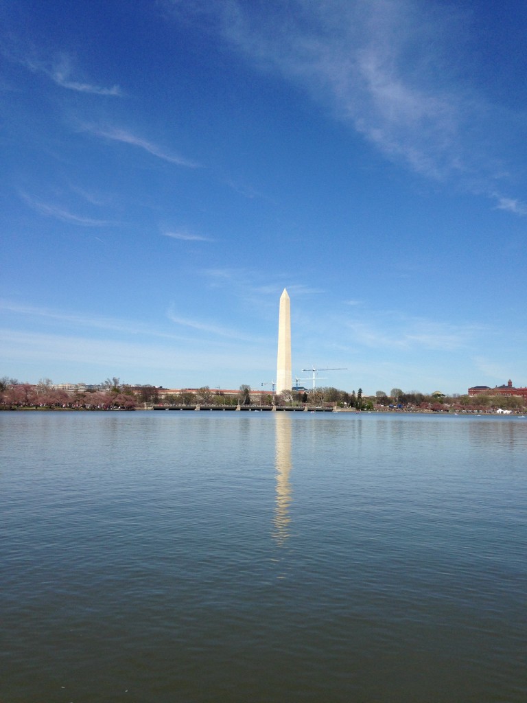 view of washington monument from across tidal basin with reflection in water