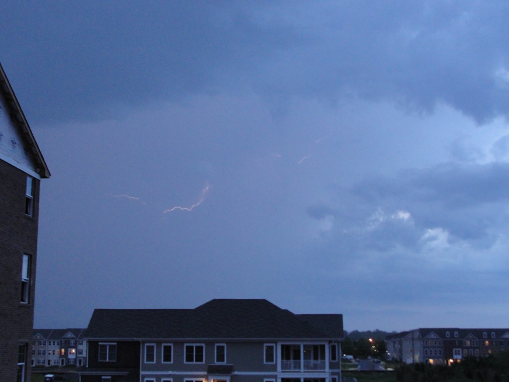 small streak of lightning stretching horizontally across sky