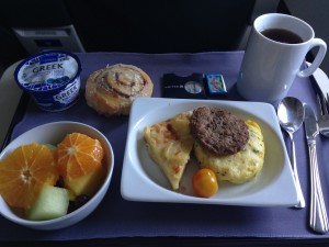 tray of hot breakfast offered in first class of united flights