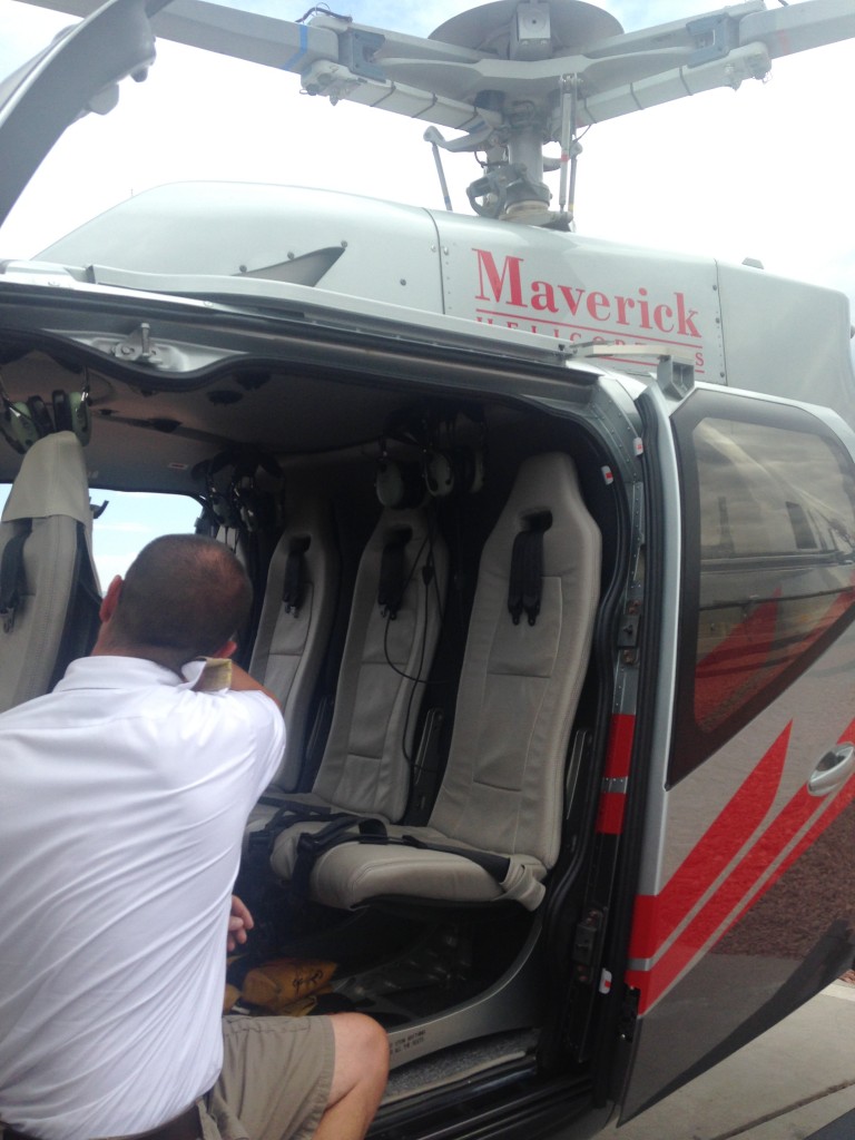 pilot explaining safety for maverick helicopter