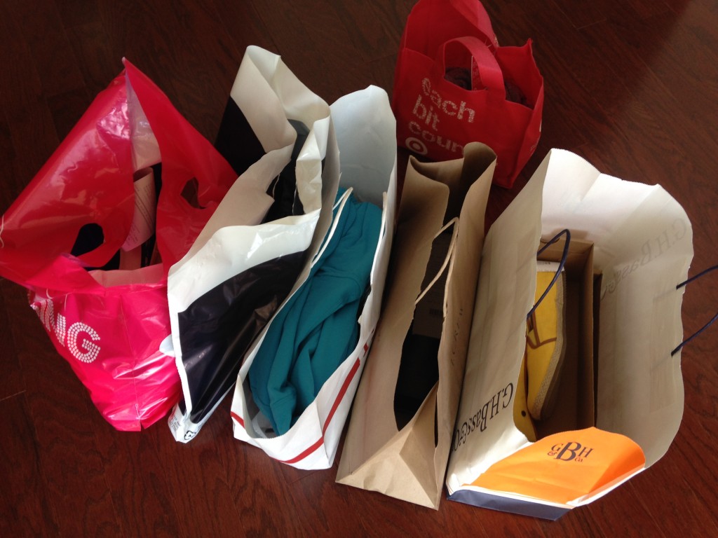 shopping bags lined up after trip to outlet