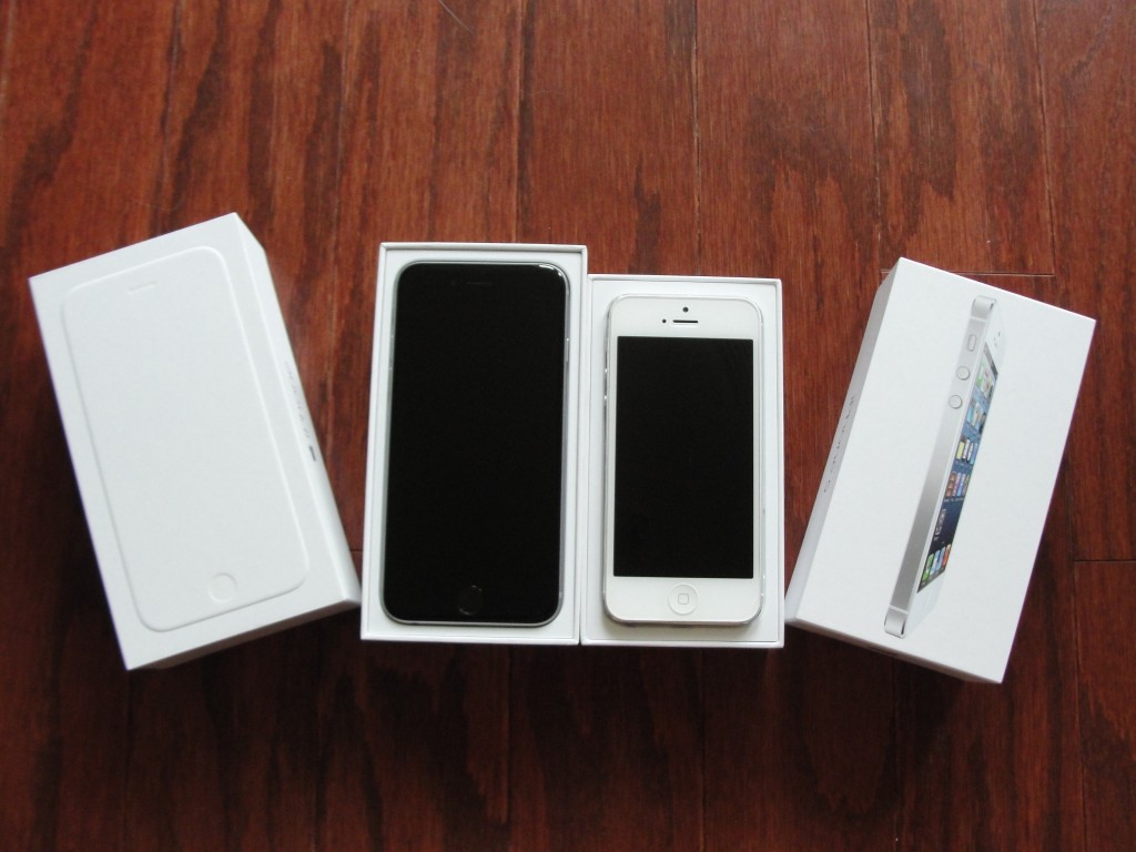 iphone 6 and iphone 5 in respective boxes with lids