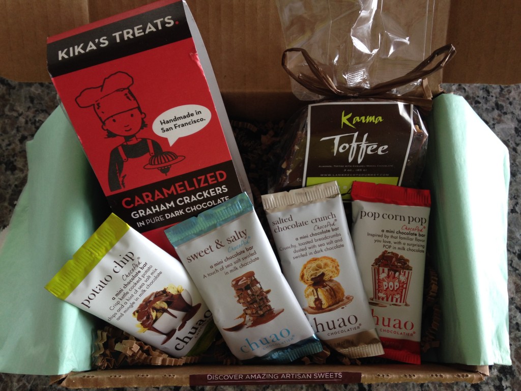 treatsie august 2014 box contents with kika's treats caramelized graham crackers in chocolate, lambrecht gourmetkarma toffee, and chuao chocolatier chocopods