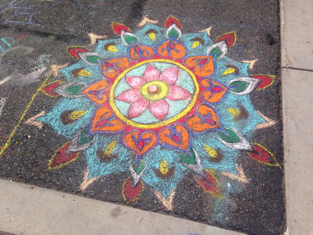 chalkfest reston chalk art drawing of flower design with candle in middle