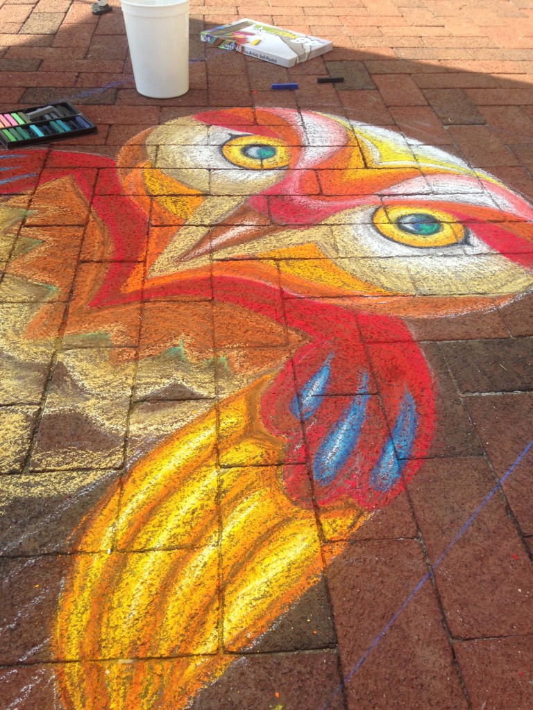 chalkfest reston chalk art drawing of colorful owl in progress