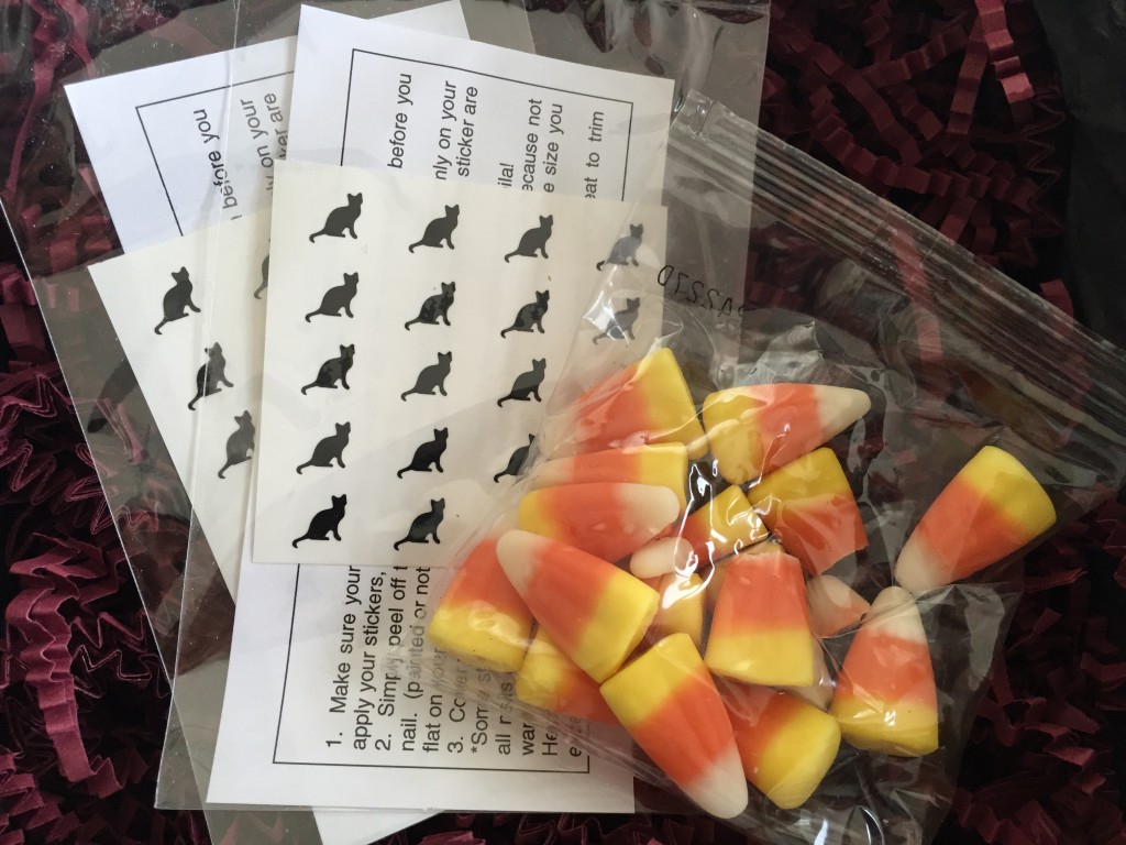 julep black cat nail decals and bag of candy corn