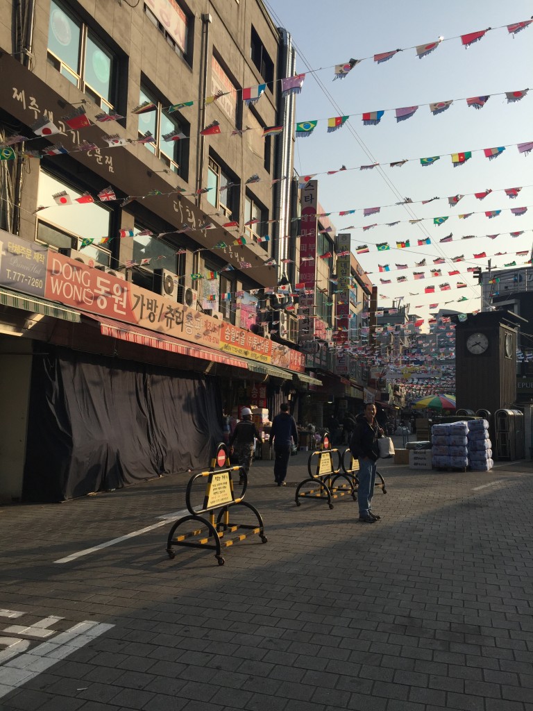namdaemun market with flags strung overhead