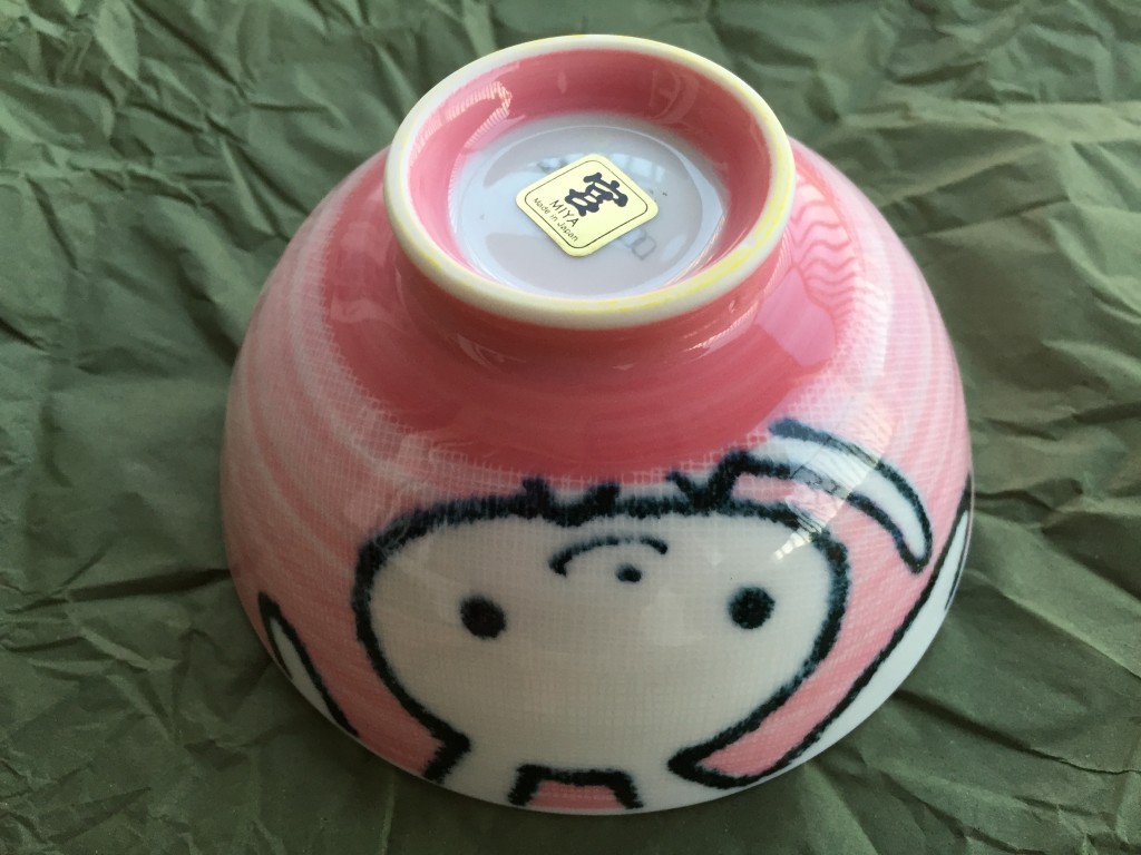 small pink bowl with cartoon bunny design on side