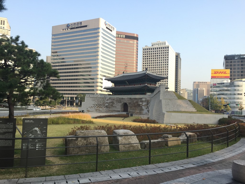 sungnyemun gate and surrounding area with large buildings in background
