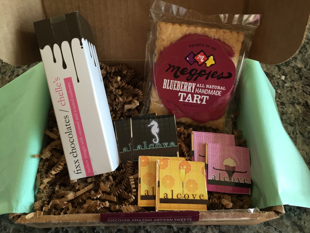 treatsie november 2014 box contents with fixx chocolates chelle's bar, megpies blueberry tart, and alcove chocolates in fleur de sel, mimosa, and red velvet