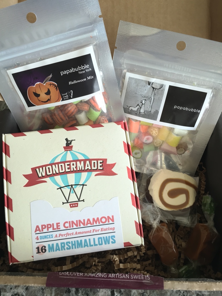 treatsie october 2014 box contents with papabubble halloween and fruit hard candy mixes, wondermade apple cinnamon marshmallows, whimsical candy la-dee-dah, and avenue sweets caramels