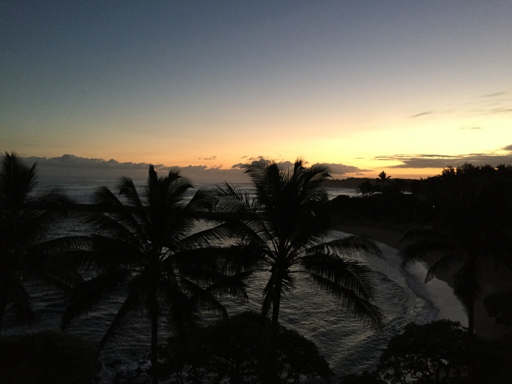 view of sunrise from turtle bay resort hotel room
