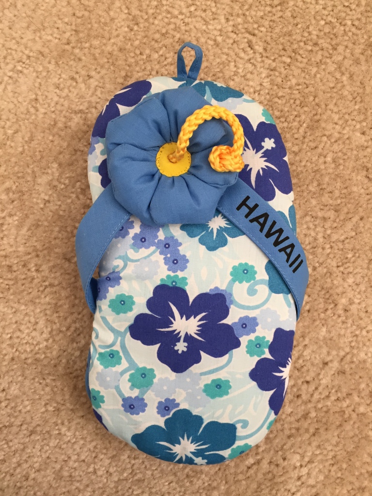blue and white flip flop oven glove from dole plantation in hawaii