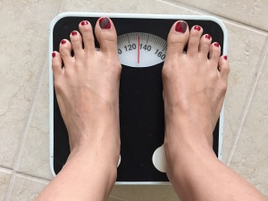 pair of women's feet on scale