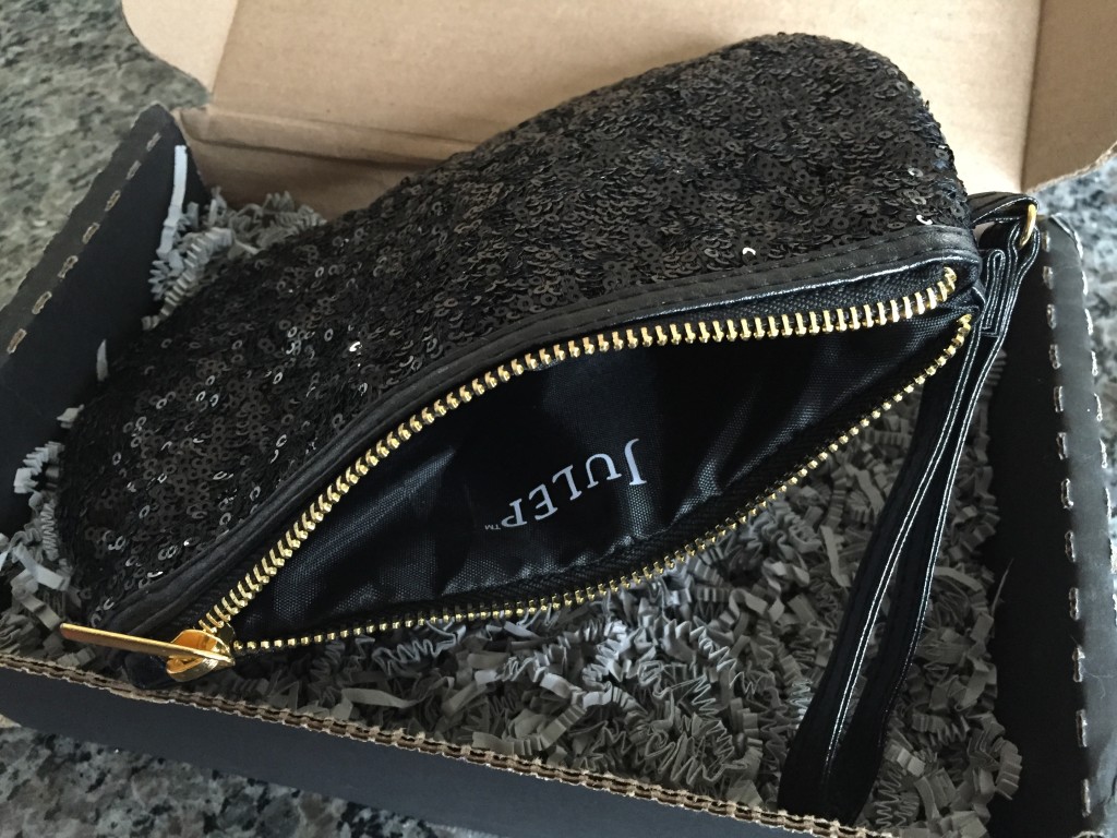 julep black sequined clutch with gold zipper and wrist strap